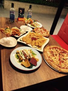we offer more than just delicious pizzas — we provide a fun and lively atmosphere where your gathering time is sure to be filled with joy. Whether you're with friends, colleagues, or family, Cheers Bar is the ideal spot for a memorable night out.